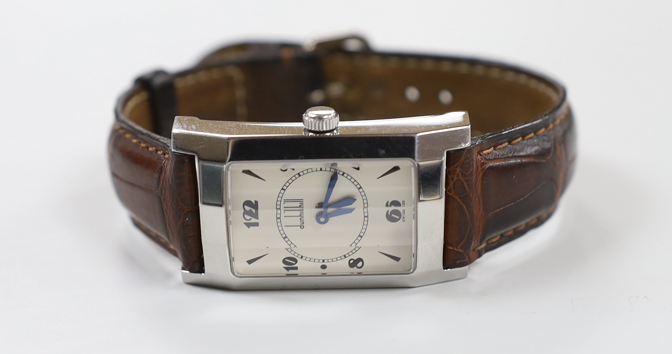 A gentleman's modern stainless steel Alfred Dunhill manual wind rectangular wrist watch, on a leather strap, with Dunhill box.